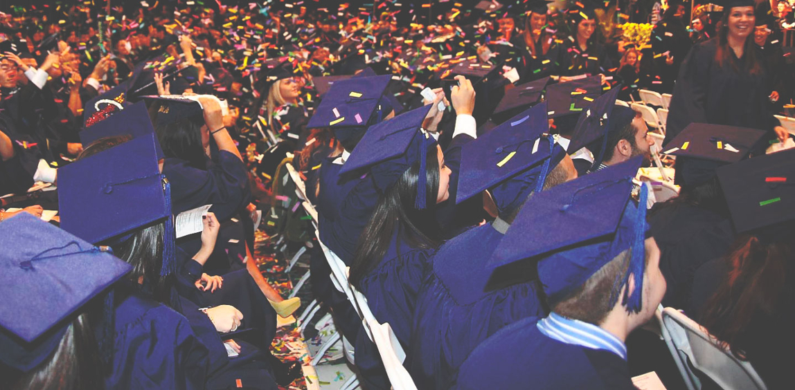 Florida International University (FIU) students celebrating graduation ceremony.